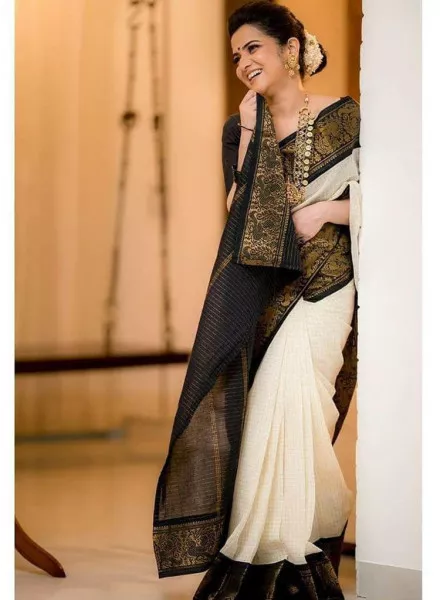 White Banarasi Silk Saree with Rich Pallu & Jacquard Work