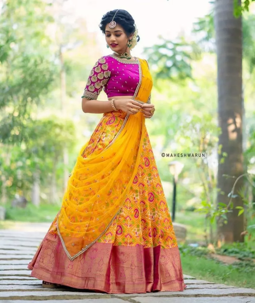 Photo of South Indian bride in yellow saree and diamond jewellery