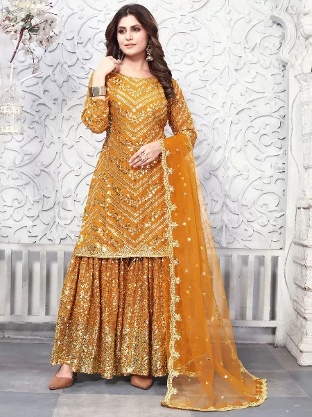 Mustard Color Sharara Suit With Top and Dupatta in Georgette With Sequence Work