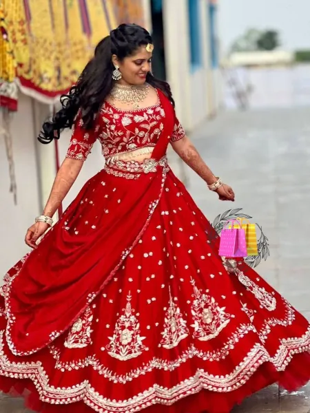 Photo of Red and grey bridal lehenga with unique blouse